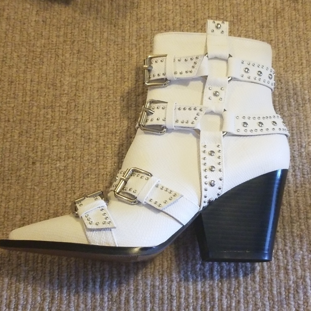 Never worn white buckle shoes